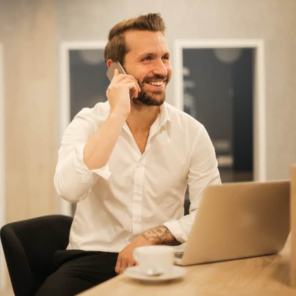 Happy customer talking with financial advisor on the phone